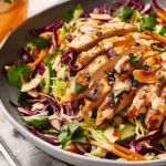 Coconut Lime Chicken and Cabbage Salad with herbs and grilled chicken