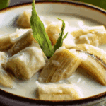 Close-up of Thai Banana in Coconut Milk in ceramic bowl