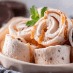 Thai Rolled Ice Cream being prepared fresh on a cold plate