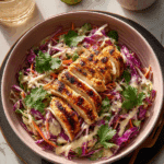 Coconut Lime Chicken and Cabbage Salad with herbs and grilled chicken