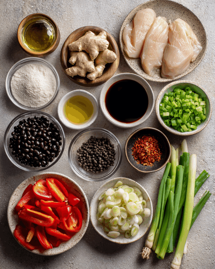 Ingredients for Chicken with Black Bean Sauce laid out.
