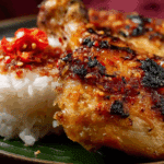 Authentic Thai Sticky Rice with Grilled Chicken served with salad and dipping sauce