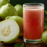 Chilled Thai guava beverage in a glass with mint and guava slice