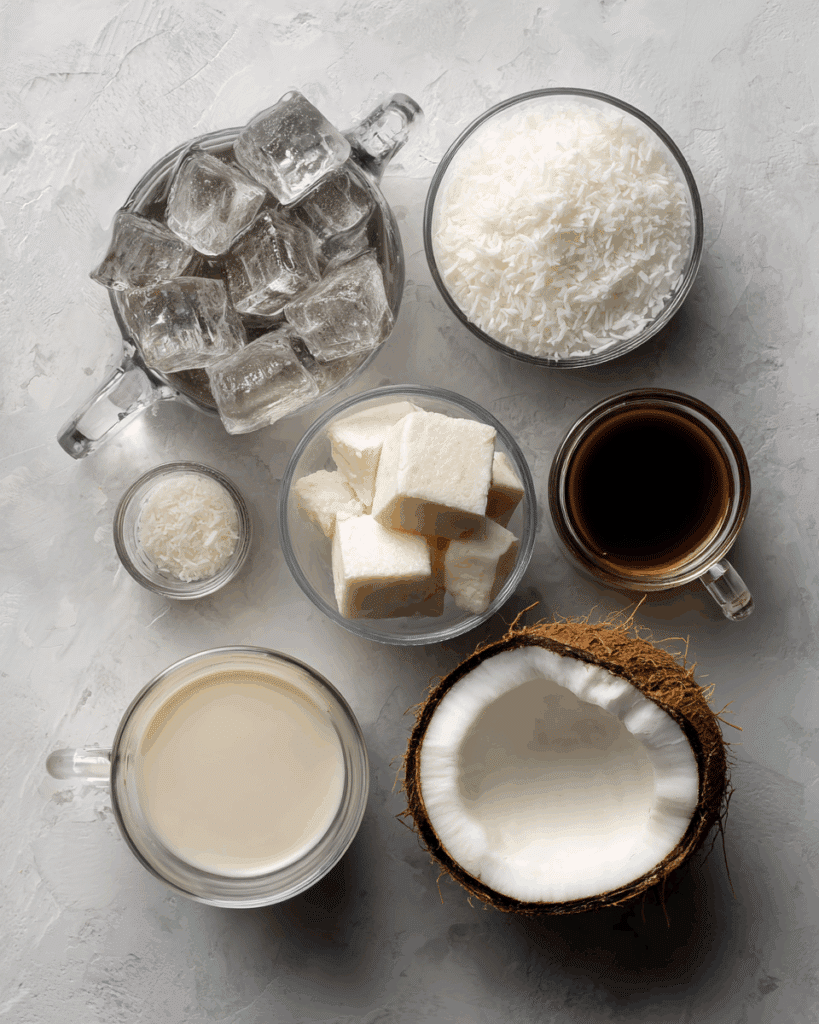Ingredients for Thai Coconut Milkshake including coconut milk, condensed milk, and ice