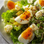 Boiled egg salad with roasted cauliflower and chickpeas
