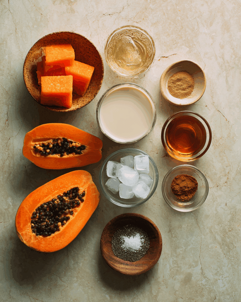 Flat lay of papaya smoothie ingredients