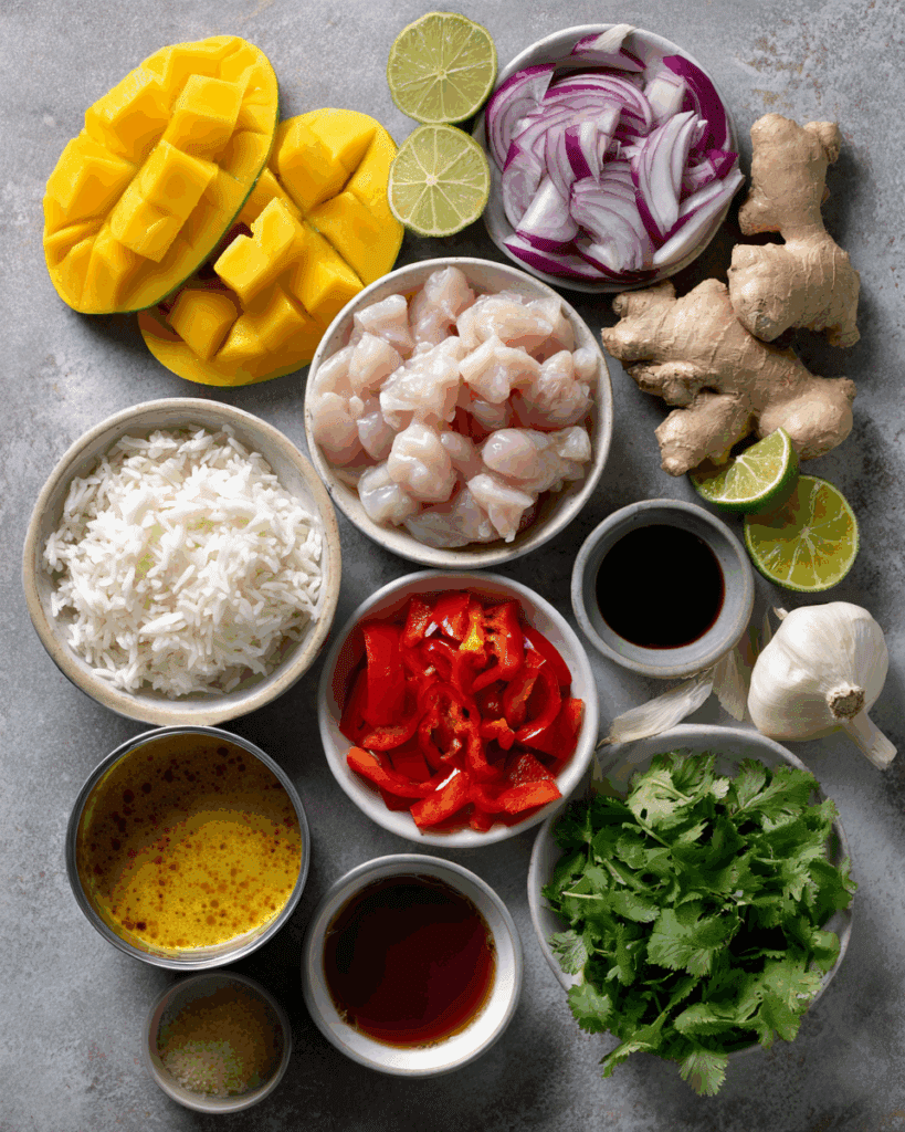 Ingredients for Thai Mango Chicken Curry including mango, chicken, coconut milk, curry paste