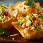 Thai Chicken Salad Wonton Cups on serving board
