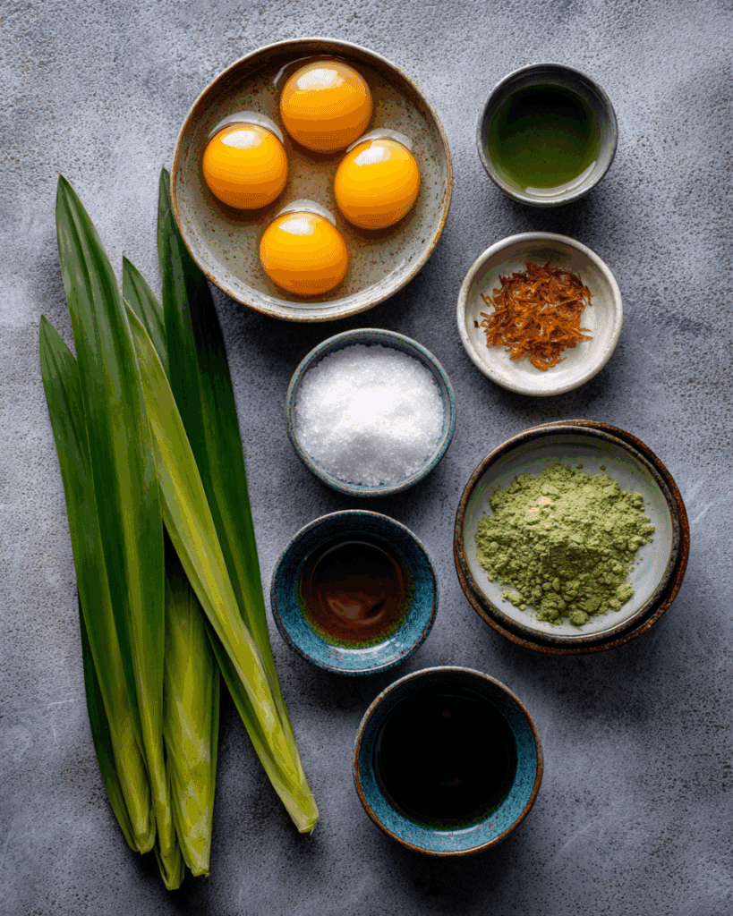 Ingredients for making Golden Egg Threads with egg yolks and pandan