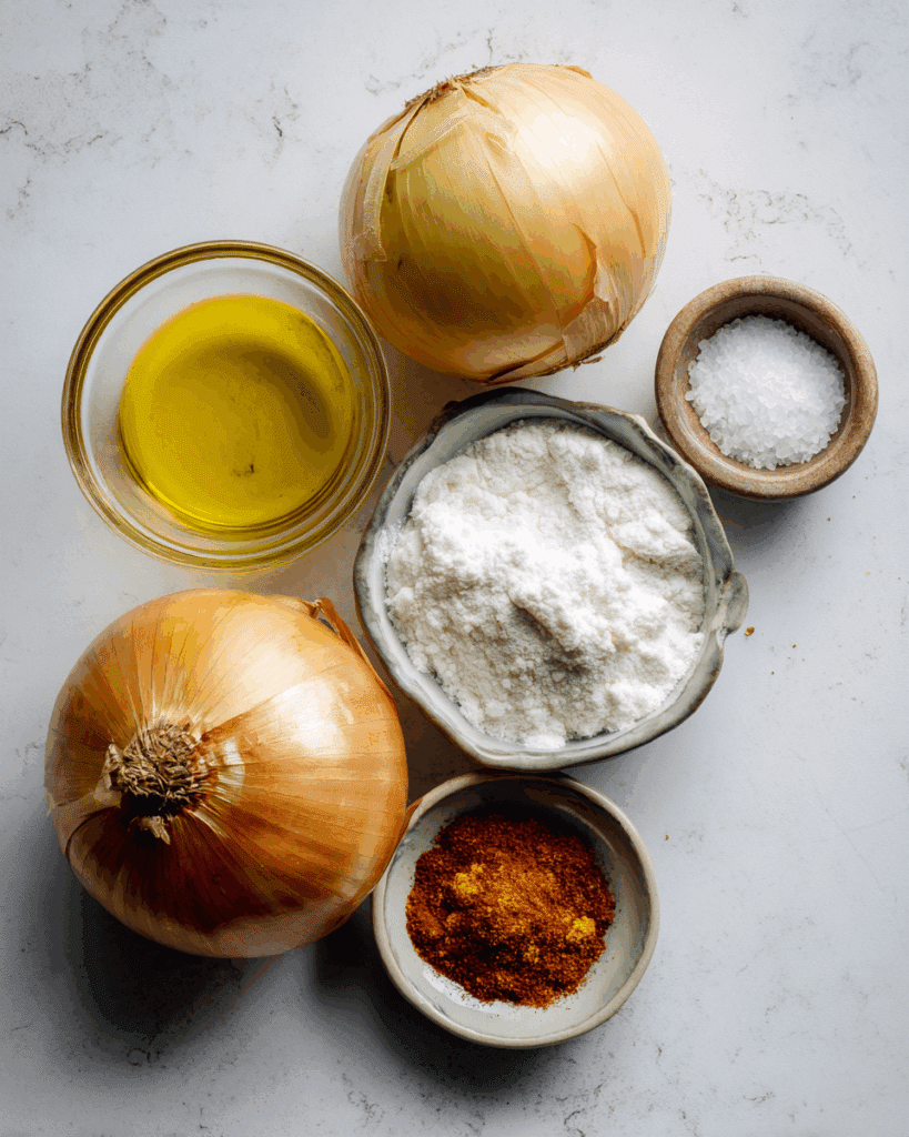 Ingredients for making fried onions: onion, cornstarch, and oil.