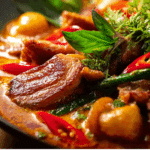 Thai Red Duck Curry served with rice and basil