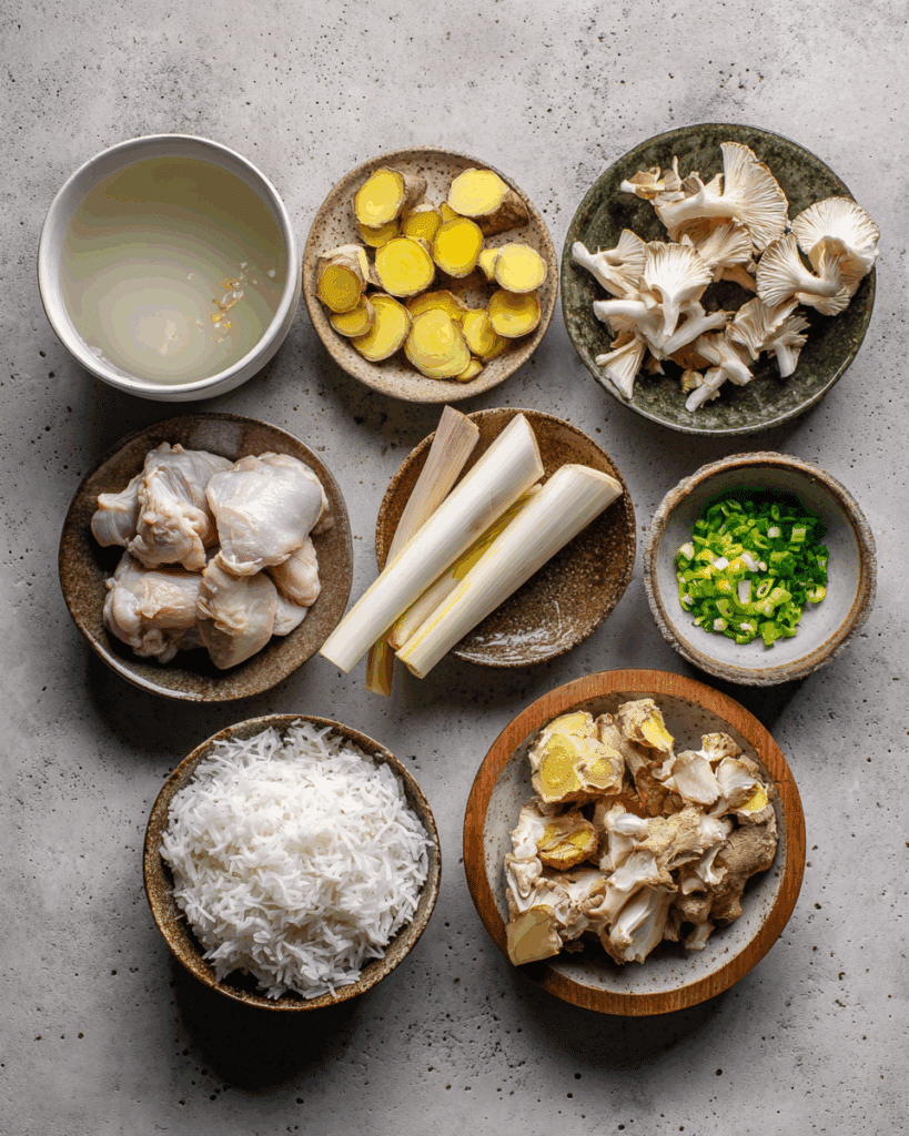 Ingredients for Coconut Galangal Chicken Soup arranged on a table.