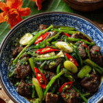 Authentic Thai Chicken Liver Stir-Fry with rice and chilies