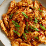 Easy Chili Garlic Chicken served with jasmine rice and herbs