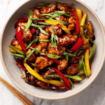 Delicious Chicken with Black Bean Sauce served with rice.