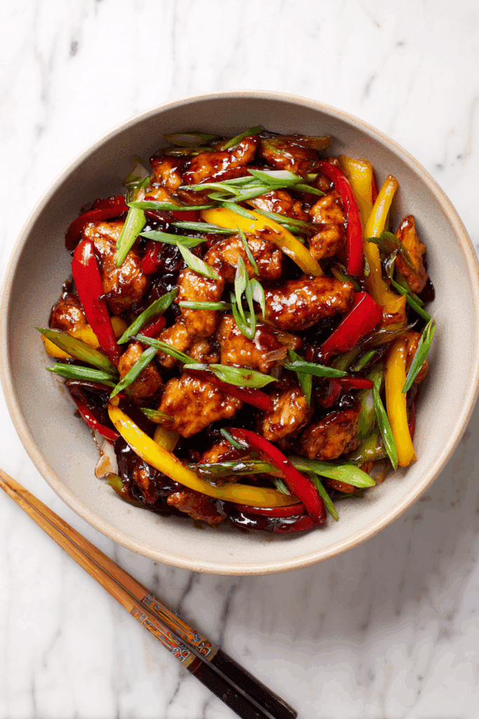 Delicious Chicken with Black Bean Sauce served with rice.