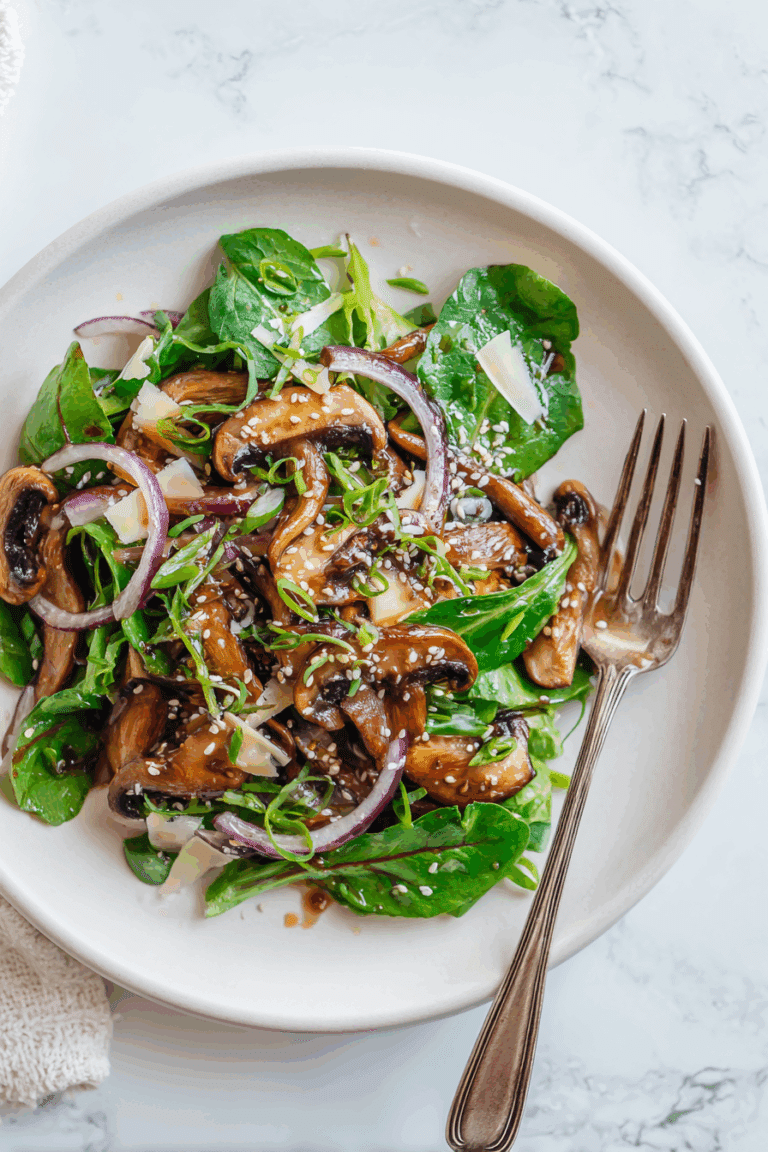 Warm mushroom salad with sesame dressing served beautifully