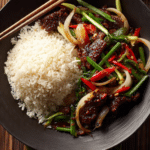 Thai Chili Beef Recipe served hot with jasmine rice, authentic Thai stir fry with chilies and tender beef