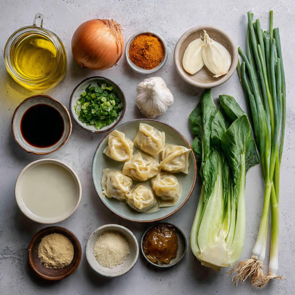 Ingredients for Thai Red Curry Wonton Soup Recipe including coconut milk, curry paste, and wontons